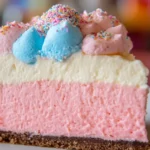 cotton candy cheesecake with whipped cream topping"